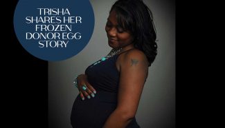 trisha holds on to belly