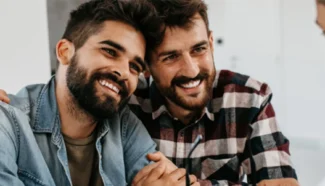 Same sex male couple speak to their doctor about fertility tips for LGBTQ families.