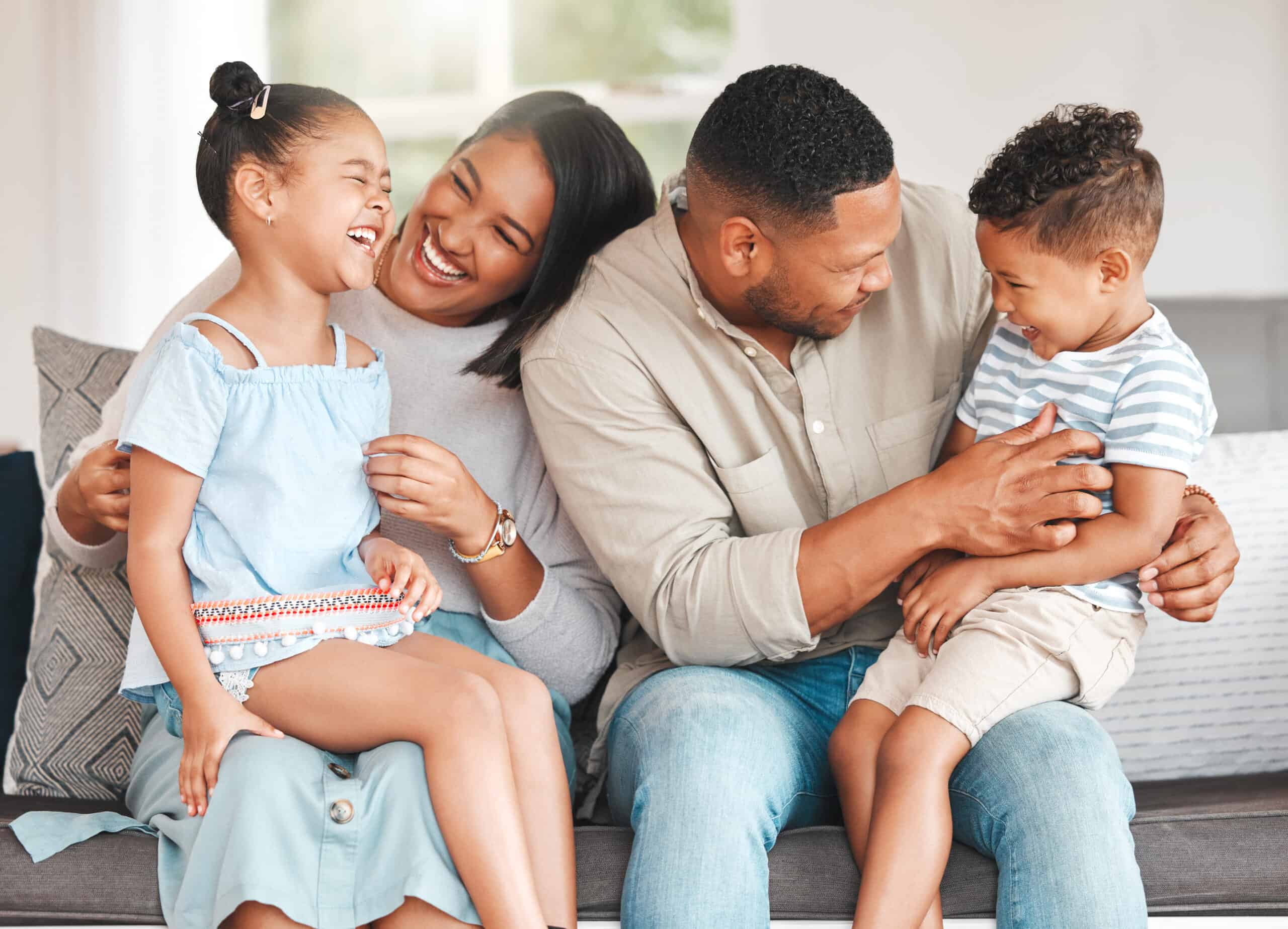 Happy family with parents and two children