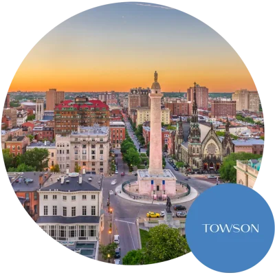 A view of the city of Baltimore and Towson, MD, with buildings and monuments in the center. Become an egg donor in Maryland today!